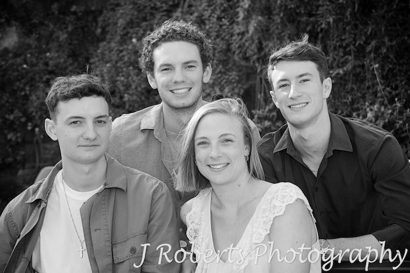4 siblings in family portrait. black and white - Family Portrait Photography Sydney
